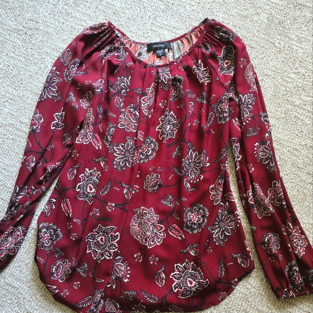 Karen Kane paisley long sleeve top.  Rust-red floral print.